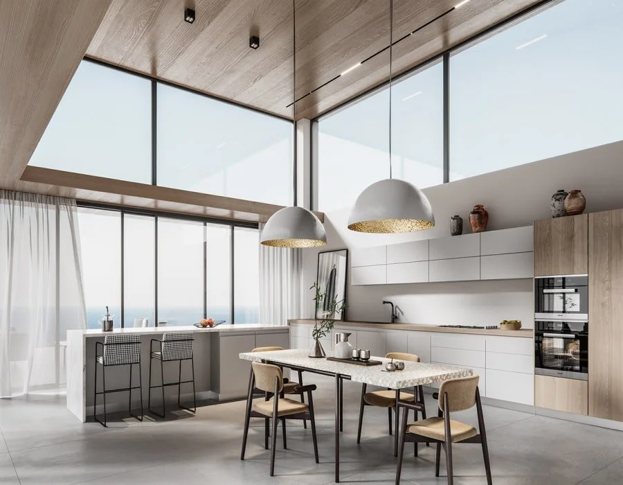 A kitchen with a table and chairs in it